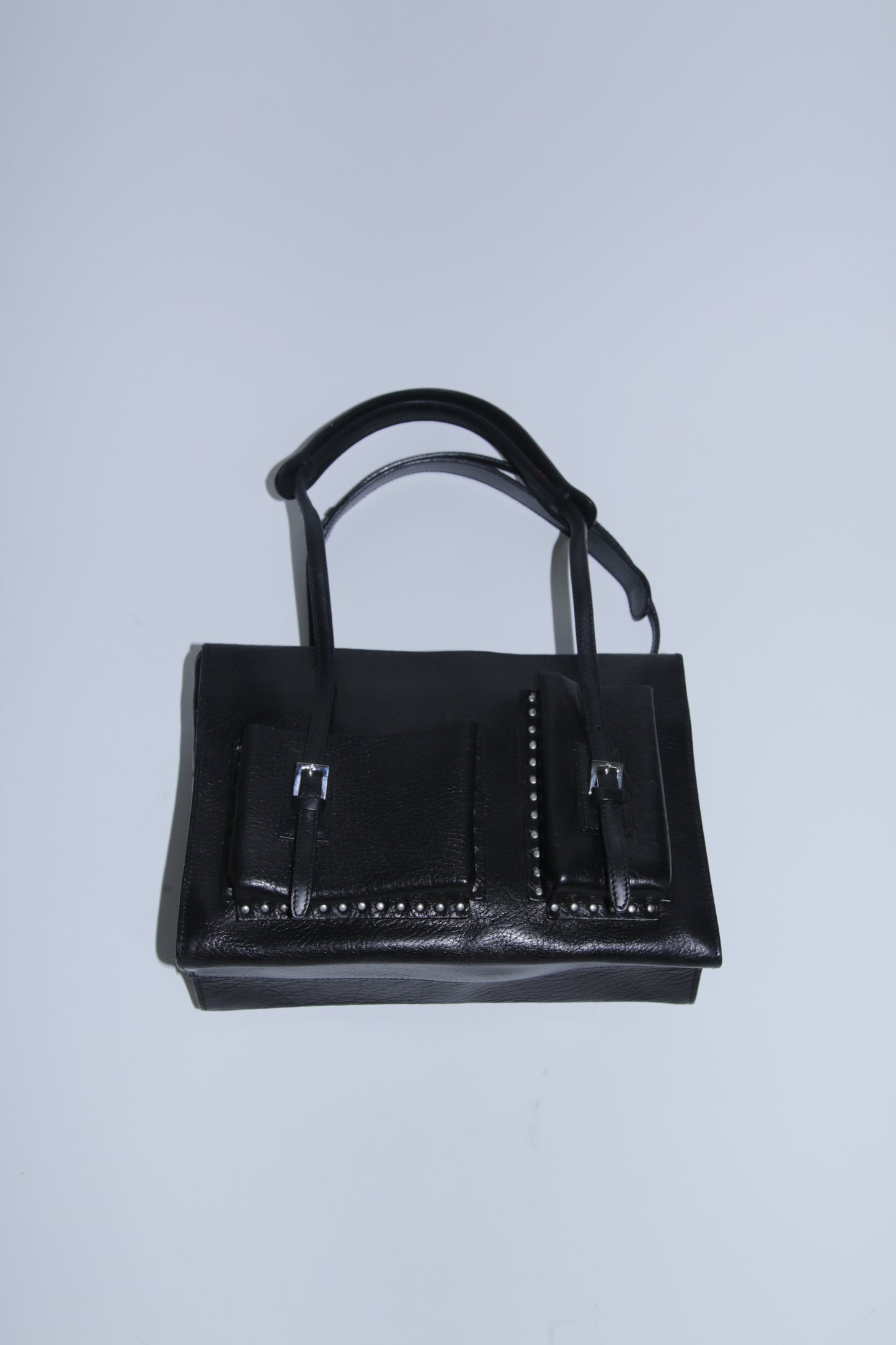 Bally 90's pocket bag in black leather and silver studs