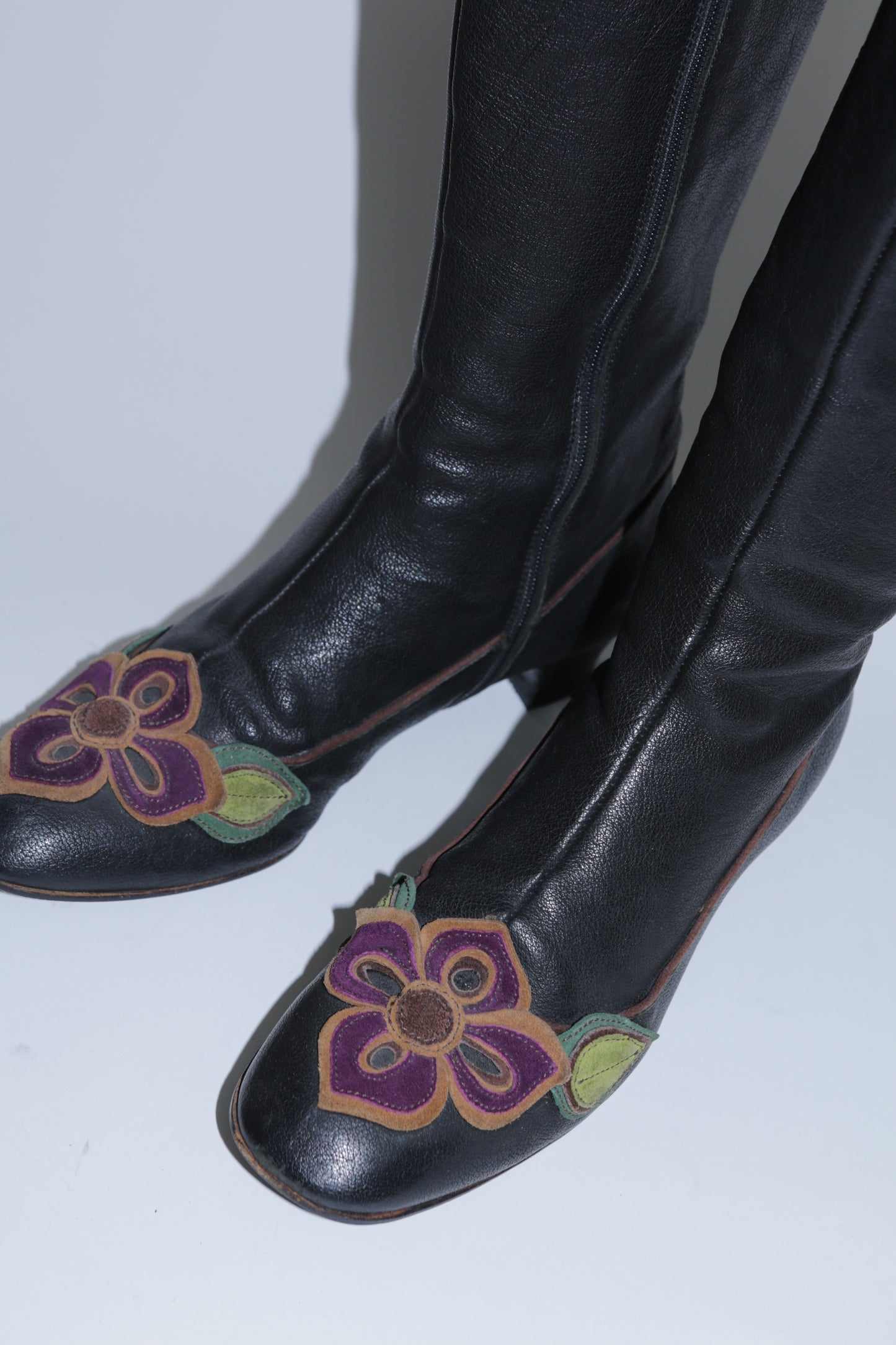 Miu Miu long leather boots with handmade leather flowers