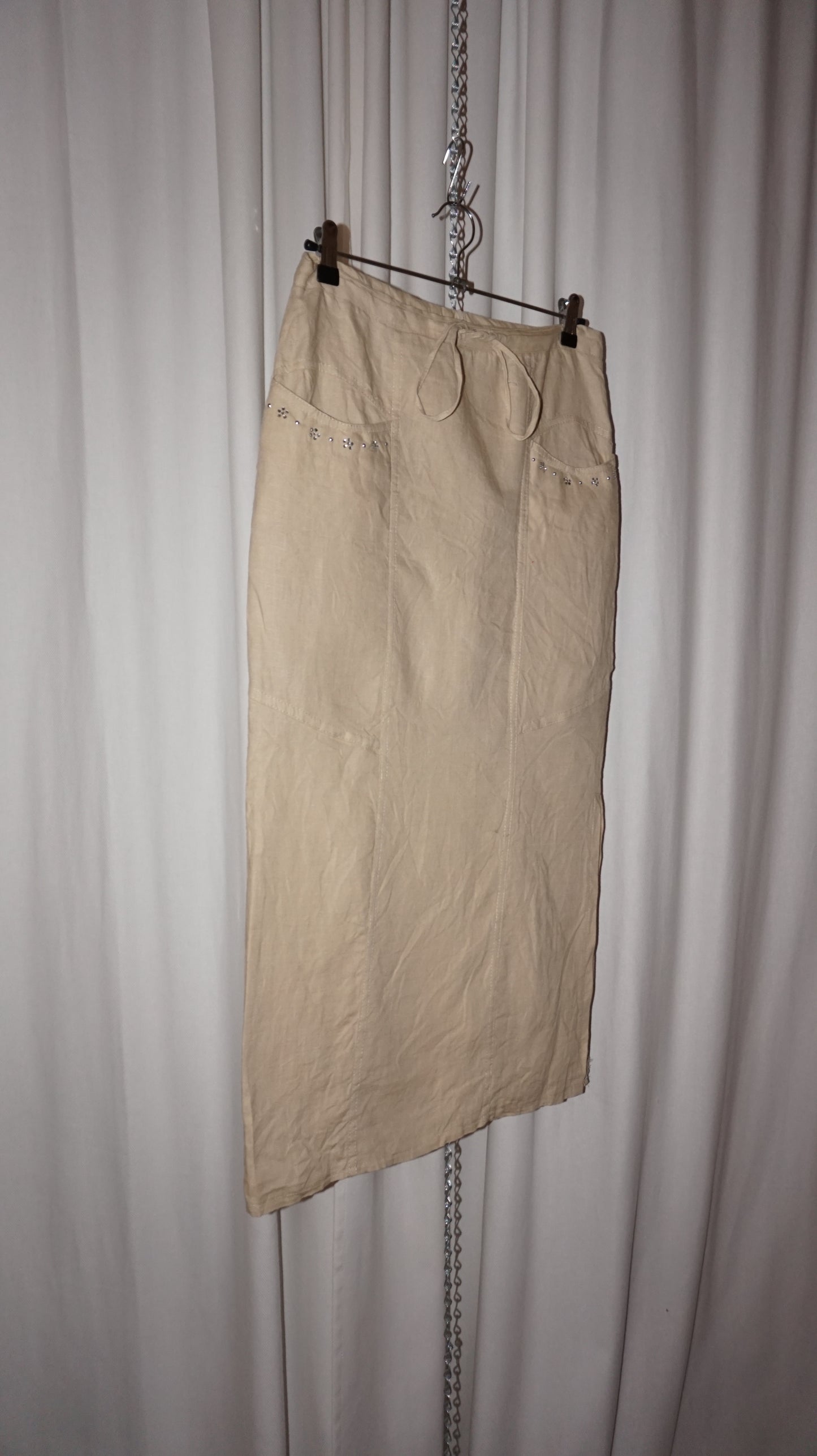 Khaki linen skirt with rhinestones at the pockets