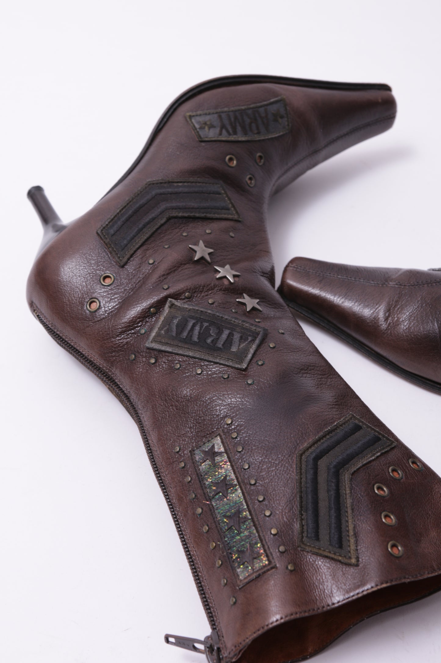 Leather short boots with patches allover