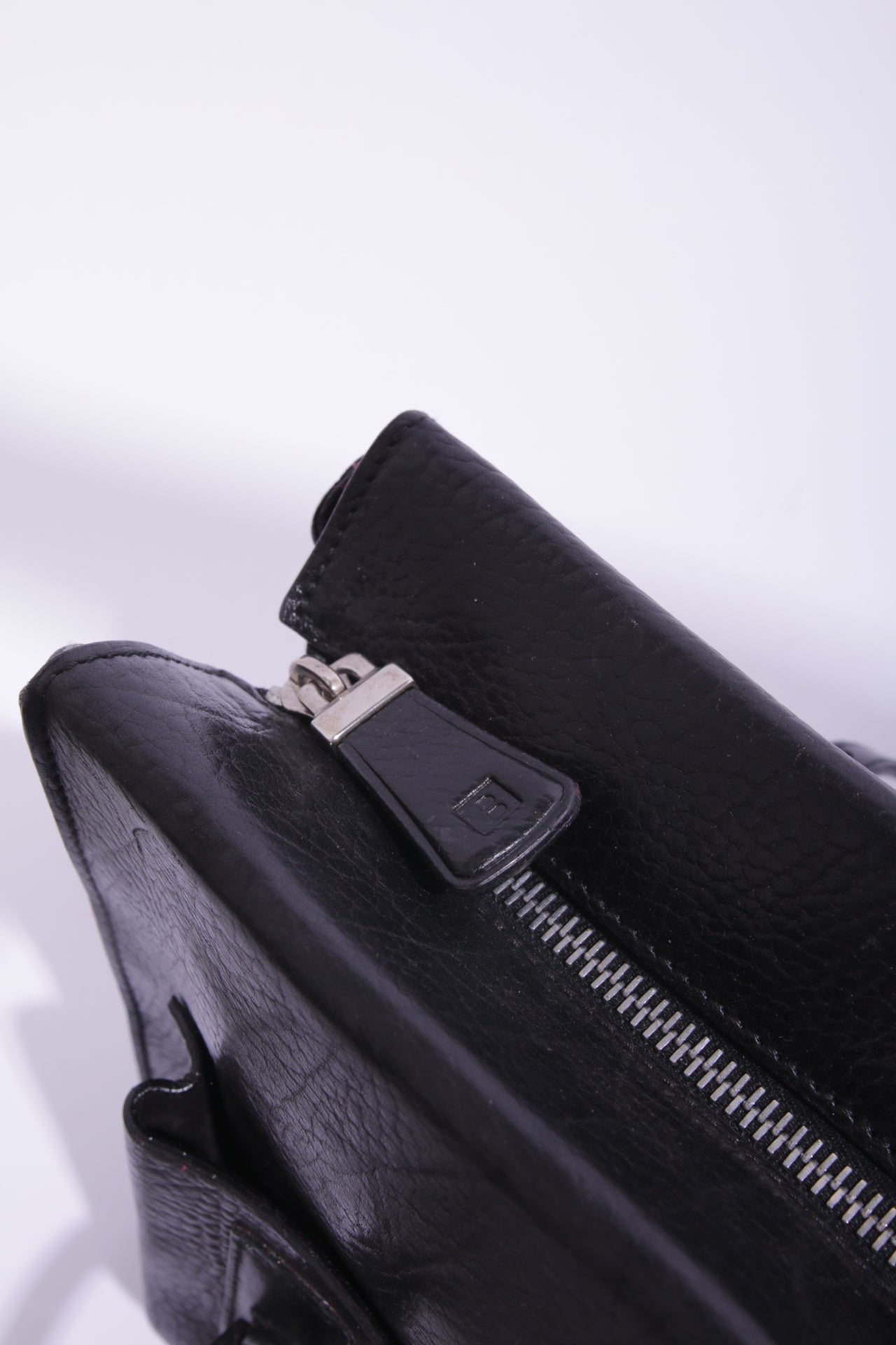 Bally 90's pocket bag in black leather and silver studs