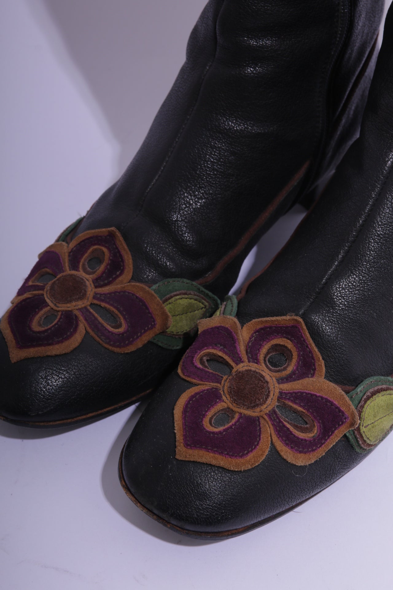 Miu Miu long leather boots with handmade leather flowers