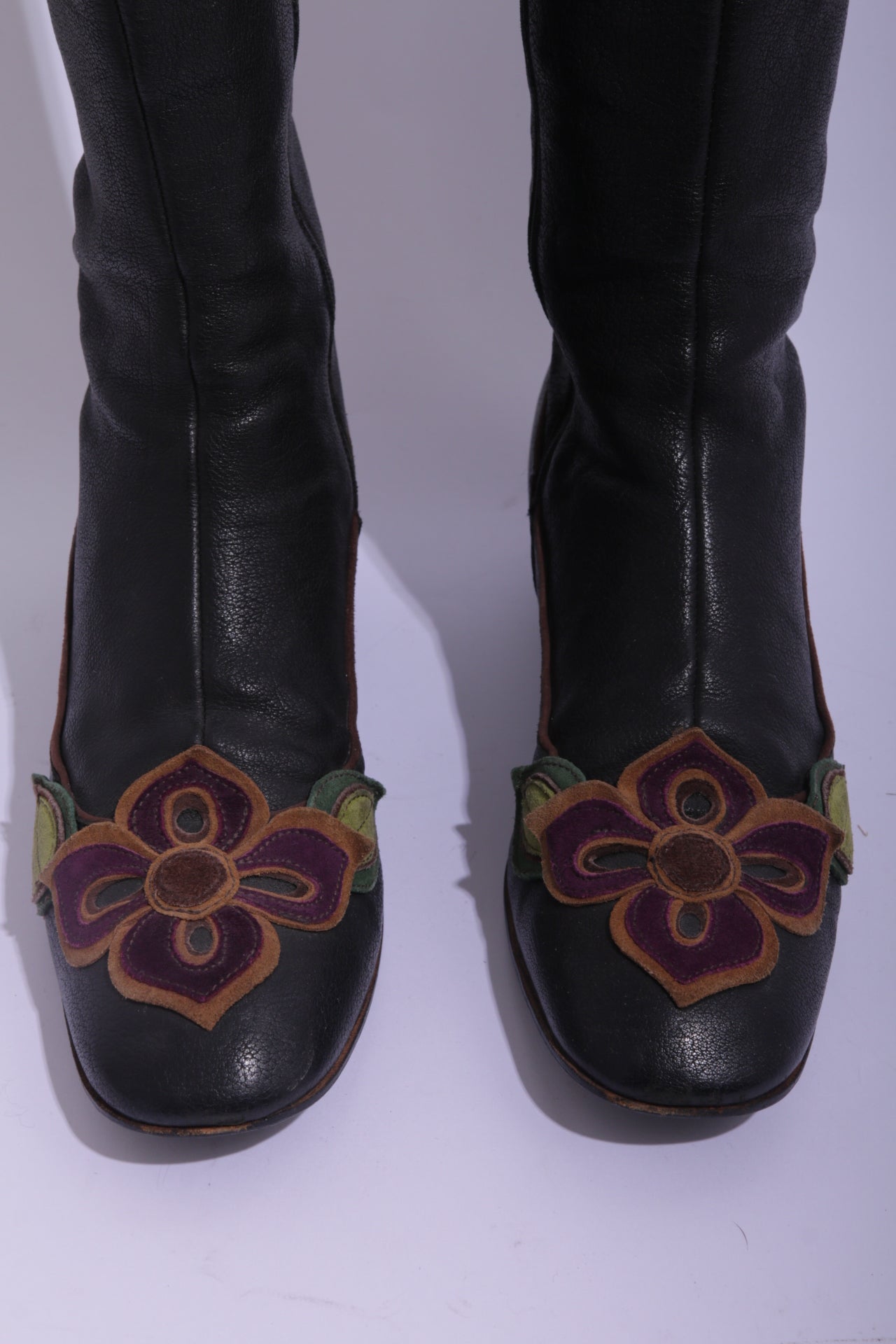 Miu Miu long leather boots with handmade leather flowers