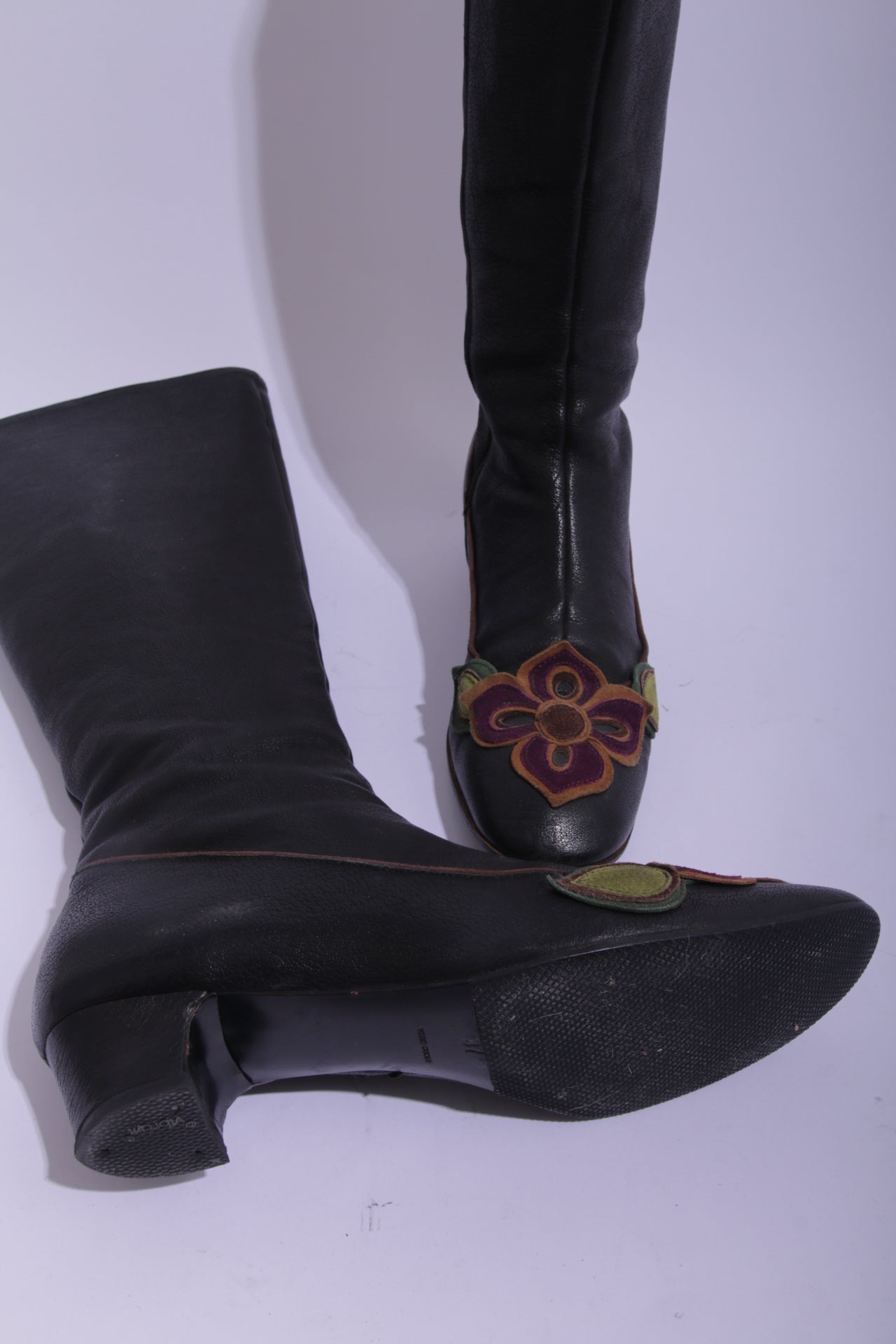 Miu Miu long leather boots with handmade leather flowers