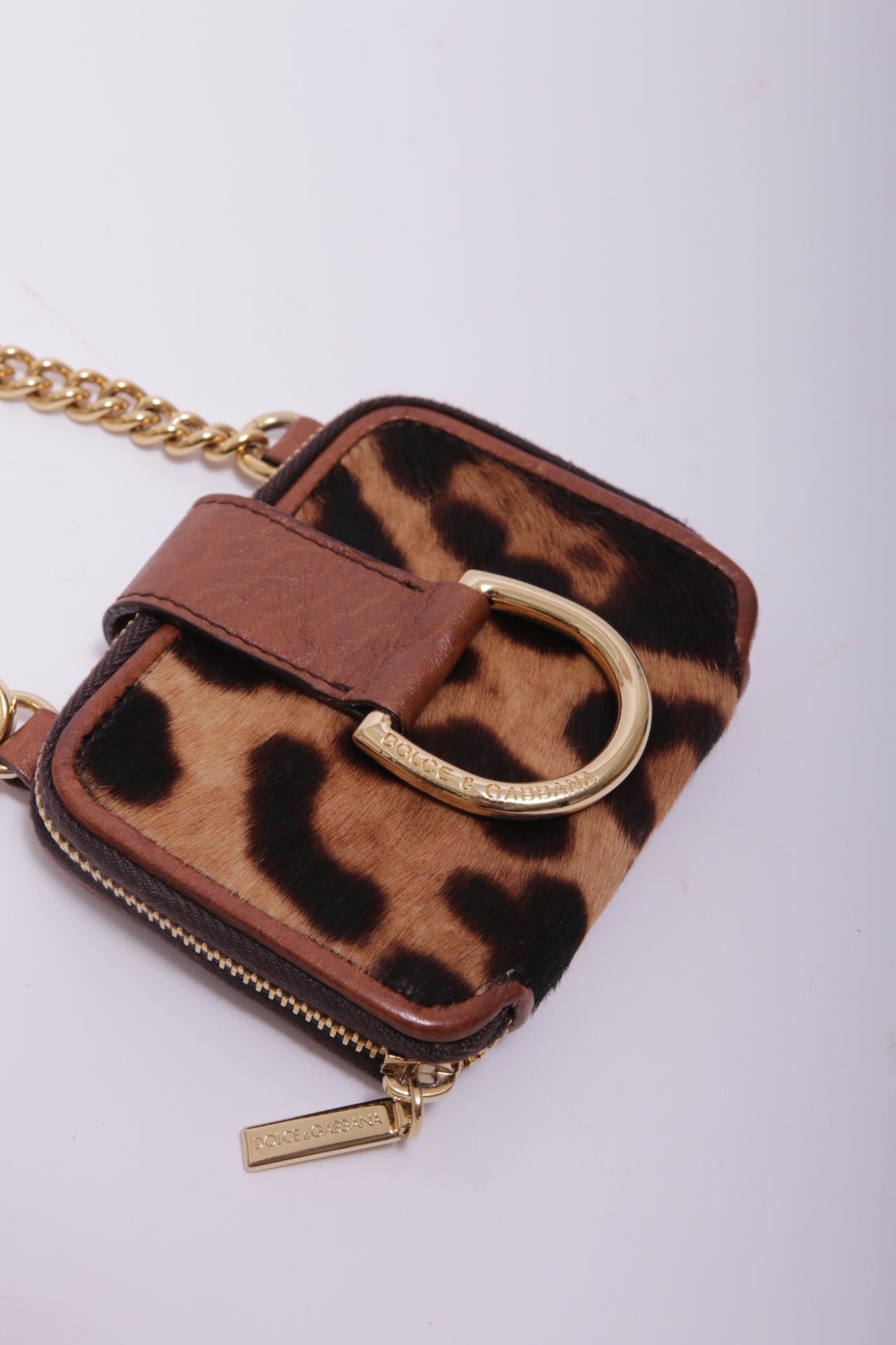 Dolce and Gabbana mini bag charm in leopard furry leather