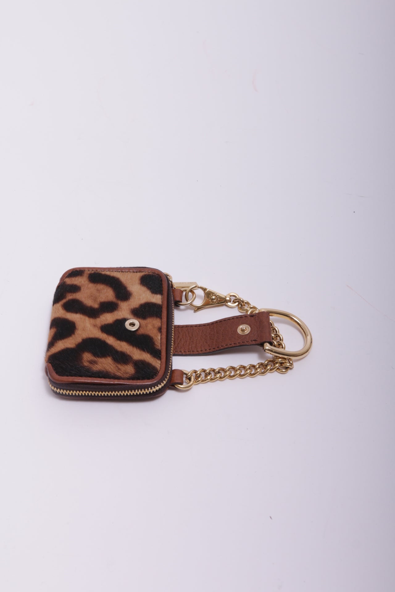 Dolce and Gabbana mini bag charm in leopard furry leather