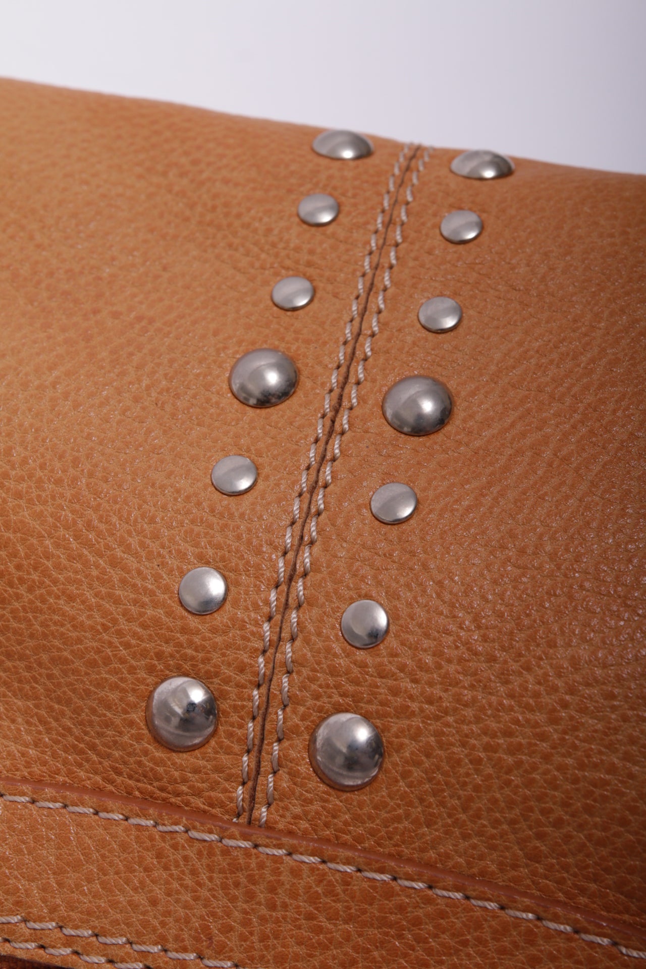 Coccinelle studded bag in camel