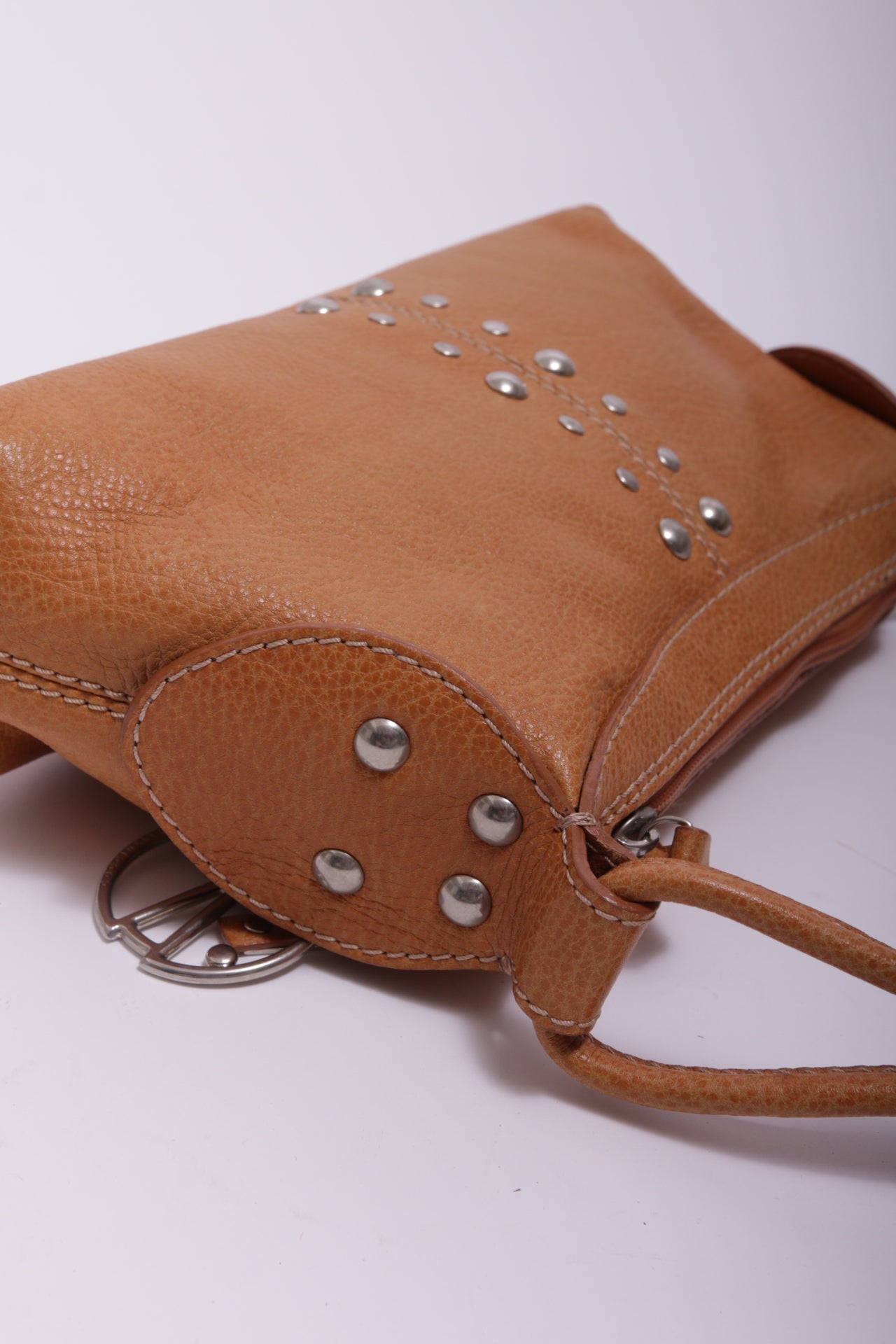 Coccinelle studded bag in camel