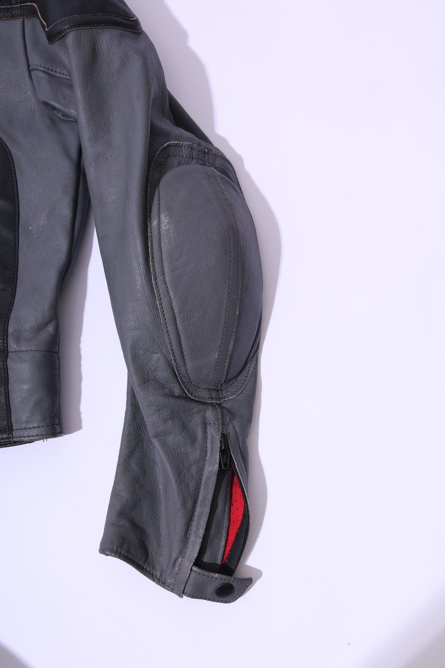 Vintage heavy leather motor jacket with short cut fit