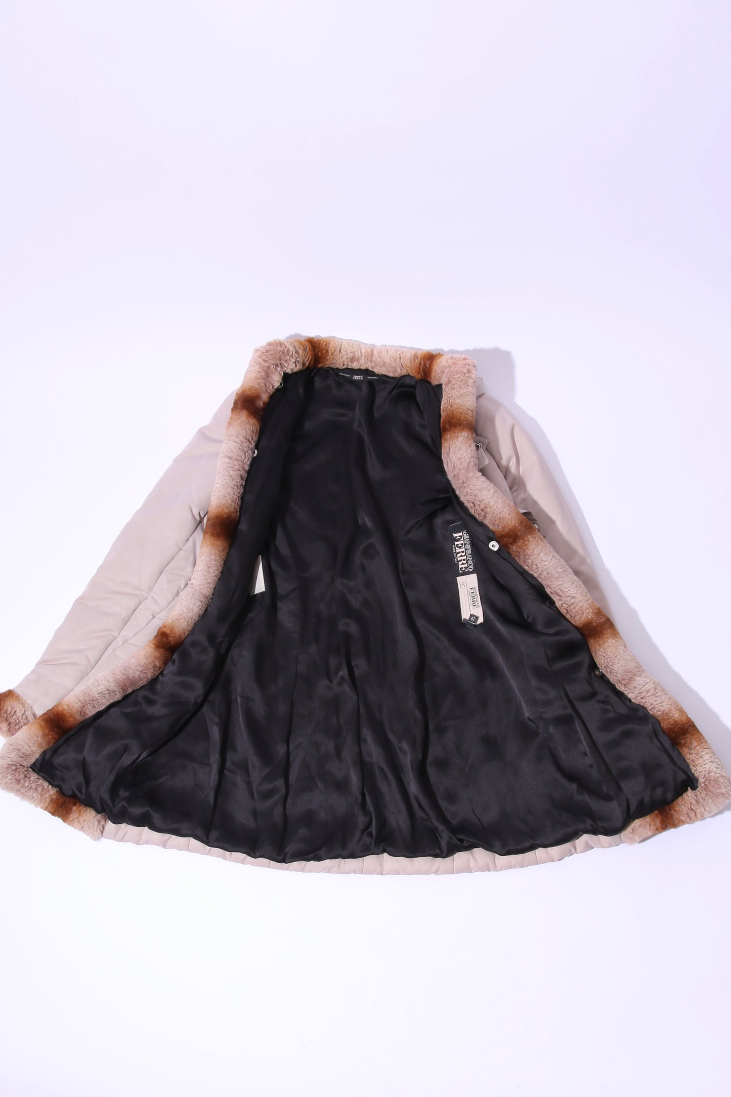 Vintage Ferre fur coat with eyelet open