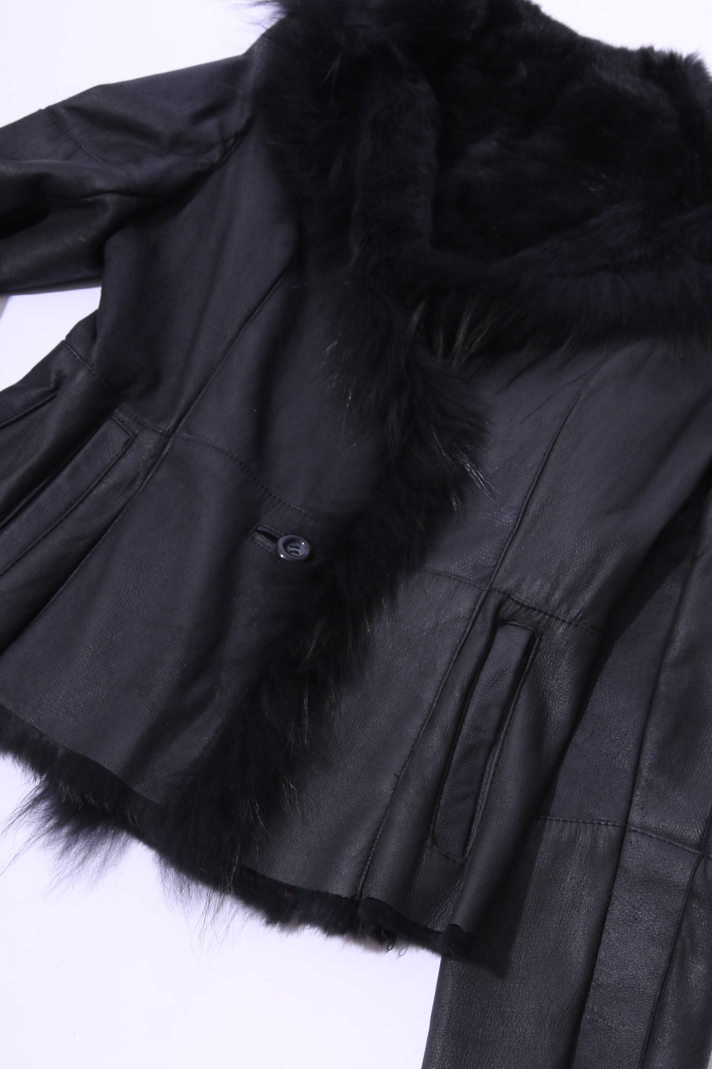 Black leather and rabbit fur coat