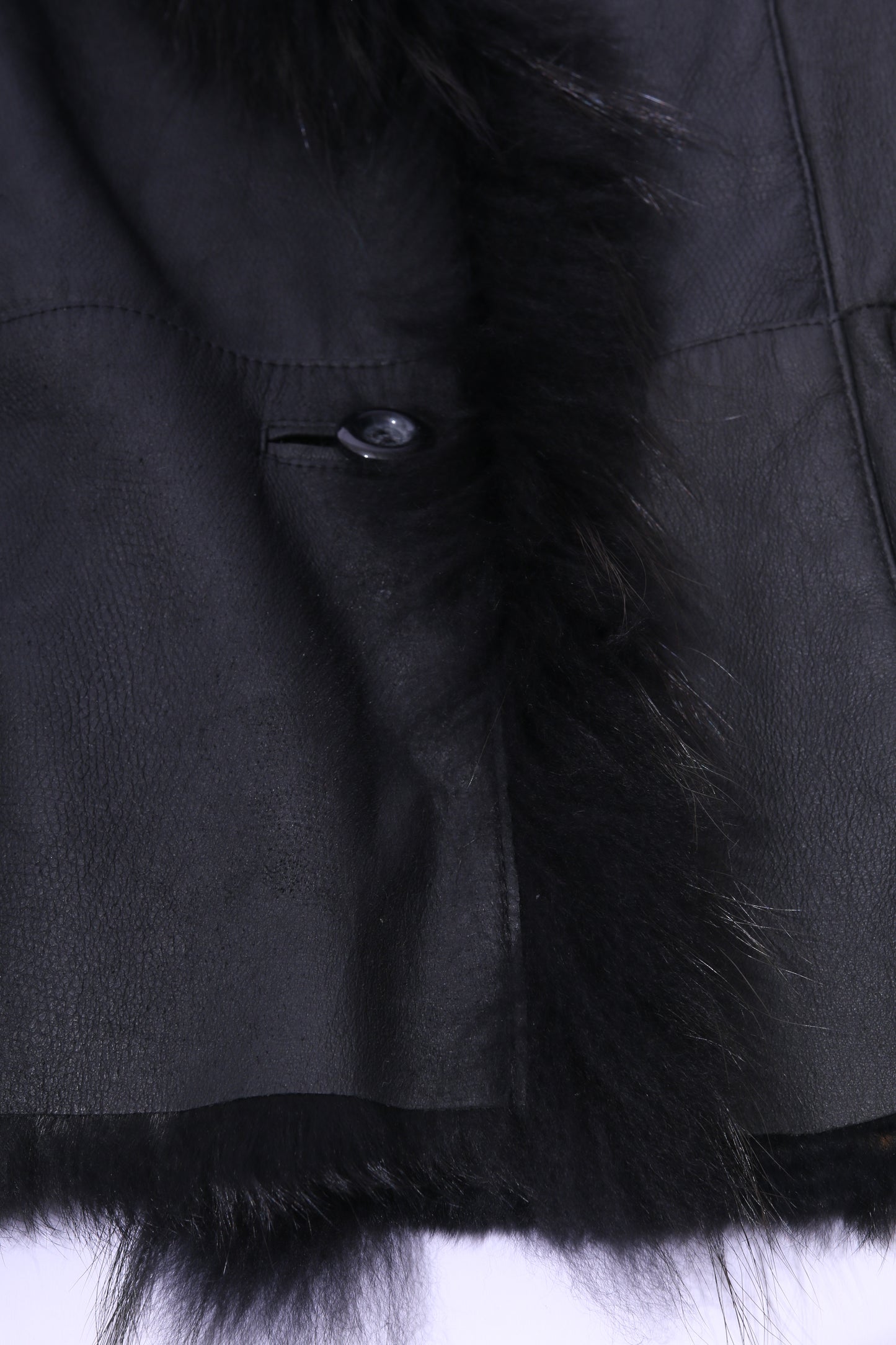 Black leather and rabbit fur coat