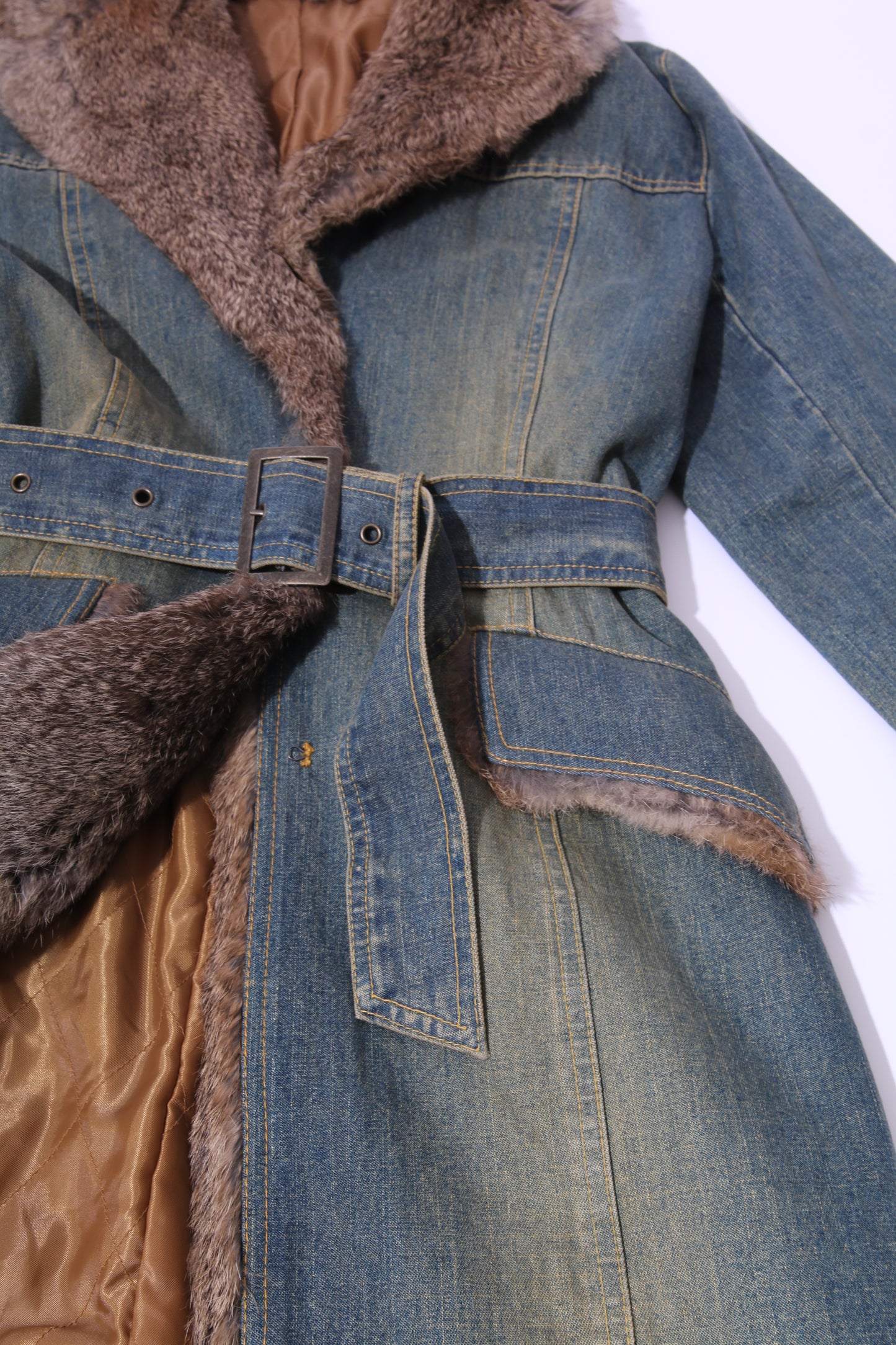 Long denim coat with waist belt and rabbit fur collar