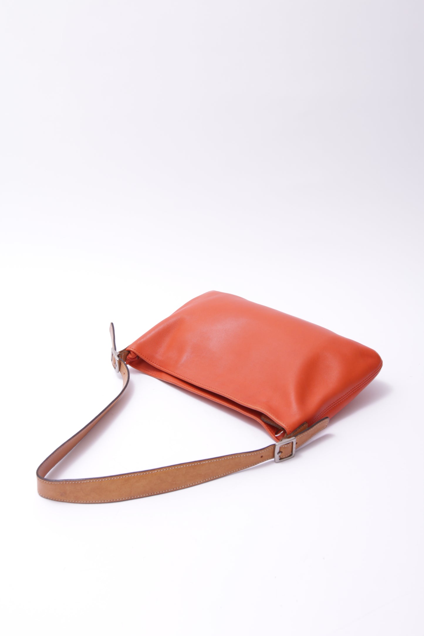 Coach leather shoulder bag in orange and brown