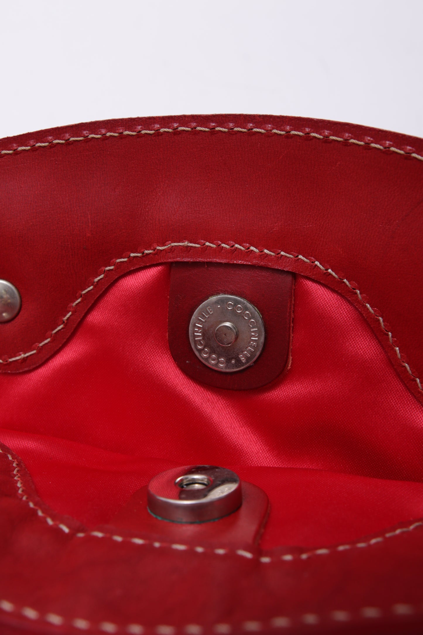 COCCINELLE red leather and straw handbag