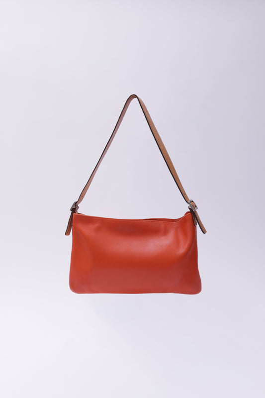 Coach leather shoulder bag in orange and brown