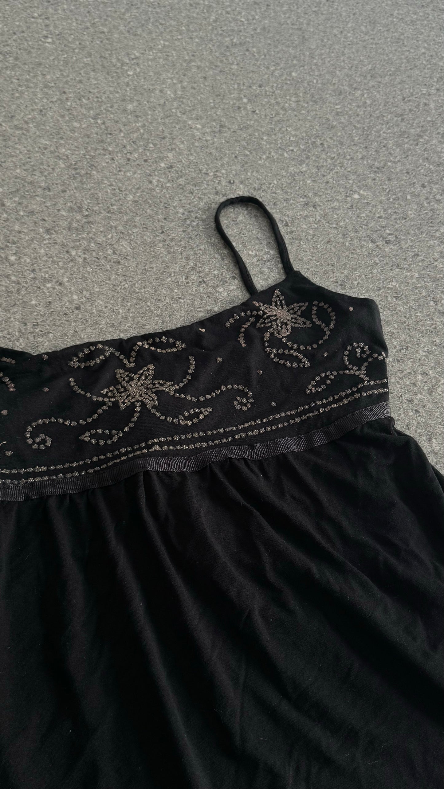 90's fit black top with back tie and beaded front